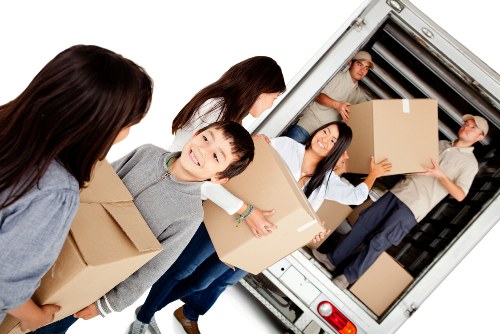 Removal van and moving crew preparing a Paddington property move