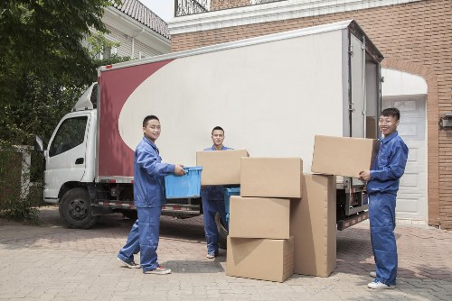Packed boxes and furniture ready for home moving in Paddington