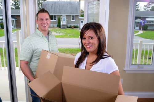 Organised office boxes and furniture ready for a Paddington business move