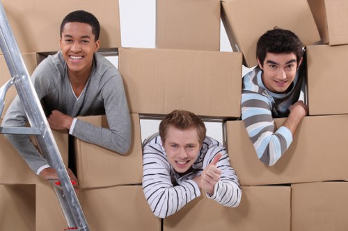 Packed office equipment and furniture prepared for local relocation