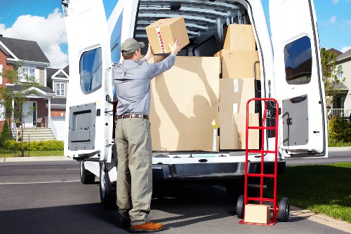 Worker handling boxes carefully during a removals job