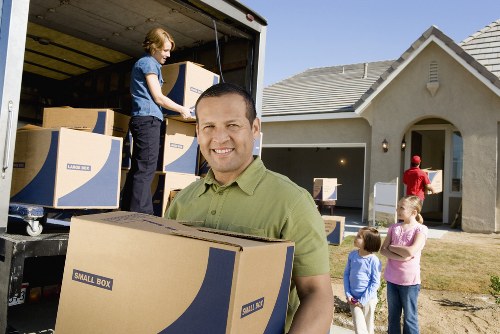 Careful handling of furniture during a house relocation in Paddington